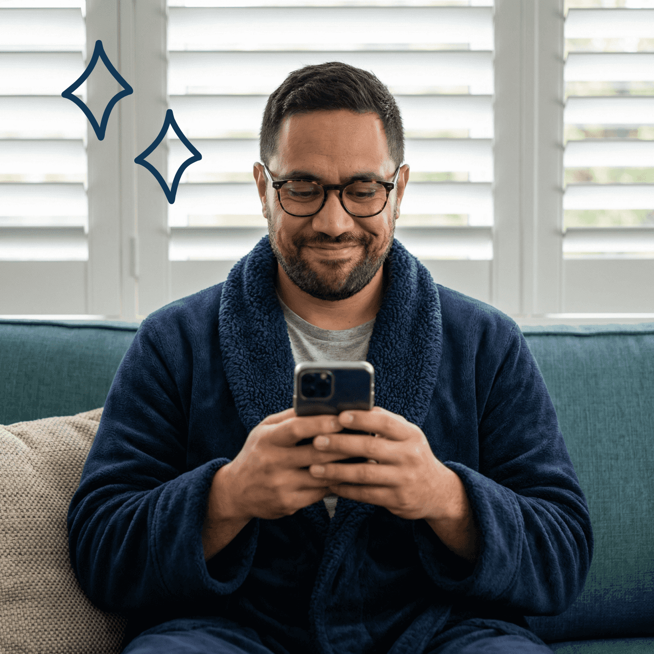 Homeowner smirking at phone while answering solar quiz on couch
